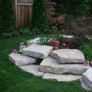 large flat stones with perennials growing in between