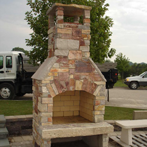 UNILOCK STONE WITH OUTDOOR FIREPLACE