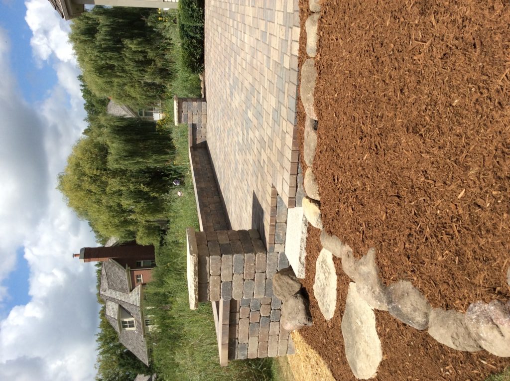 BACKYARD PATIO WITH UNILOCK BRUSSEL STONE