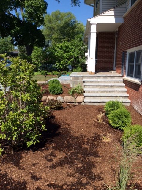 Front walkway with steps to garden